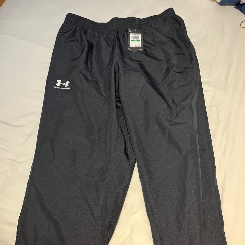 Mens Under Armour wind pants.